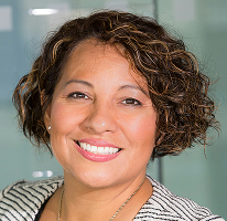 Portrait of Claire Ashford, head of compliance, covering financial regulation